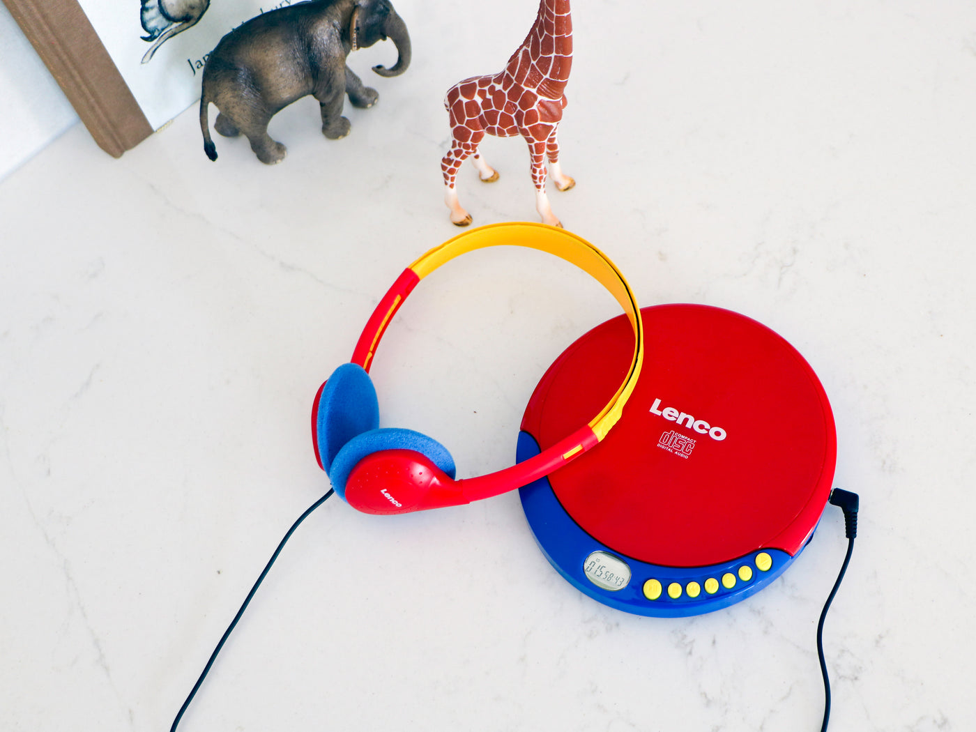 Lenco CD-021KIDS - Lecteur CD portable pour enfants avec casque, piles rechargeables et limiteur de son intégré - Multicolore